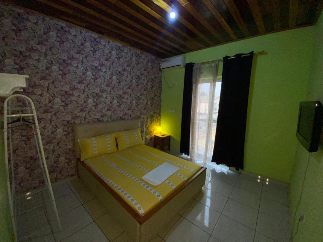 דואלה Cave Royale - Chambres-Studios-Apparts Meubles - Logpom Hopithal Des Soeurs Apres Camara Laye מראה חיצוני תמונה