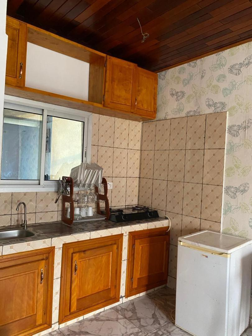 דואלה Cave Royale - Chambres-Studios-Apparts Meubles - Logpom Hopithal Des Soeurs Apres Camara Laye מראה חיצוני תמונה